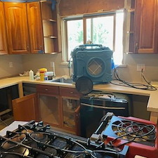 Insurance Repair & Refinishing kitchen Cabinets, New Countertops and Backsplash 8